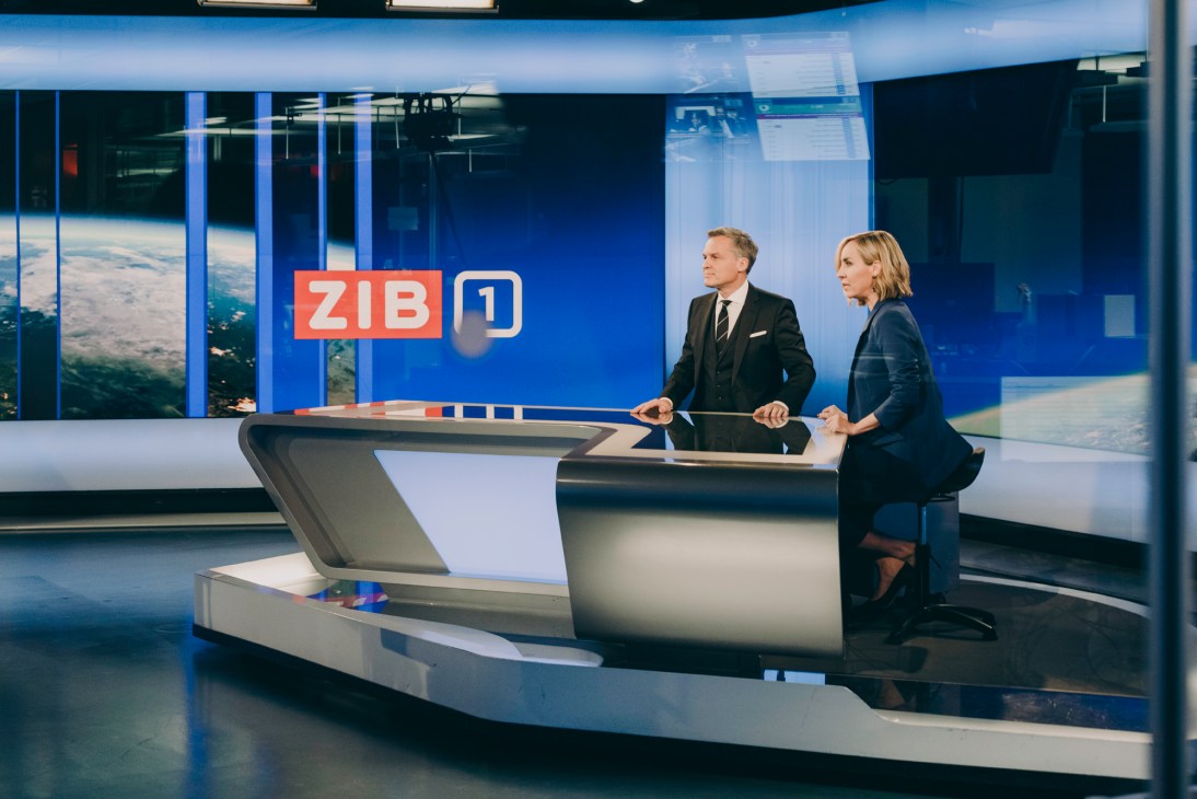 Anchors Tarek Leitner and Nadja Bernhard in the studio during the broadcast of ORF's main news programme 'Zib 1'