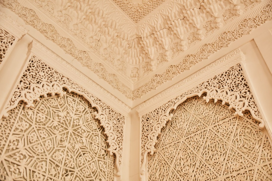 Ornate pressed plaster ceiling with intricate Islamic geometric patterns and decorative moldings at the Romanov Palace