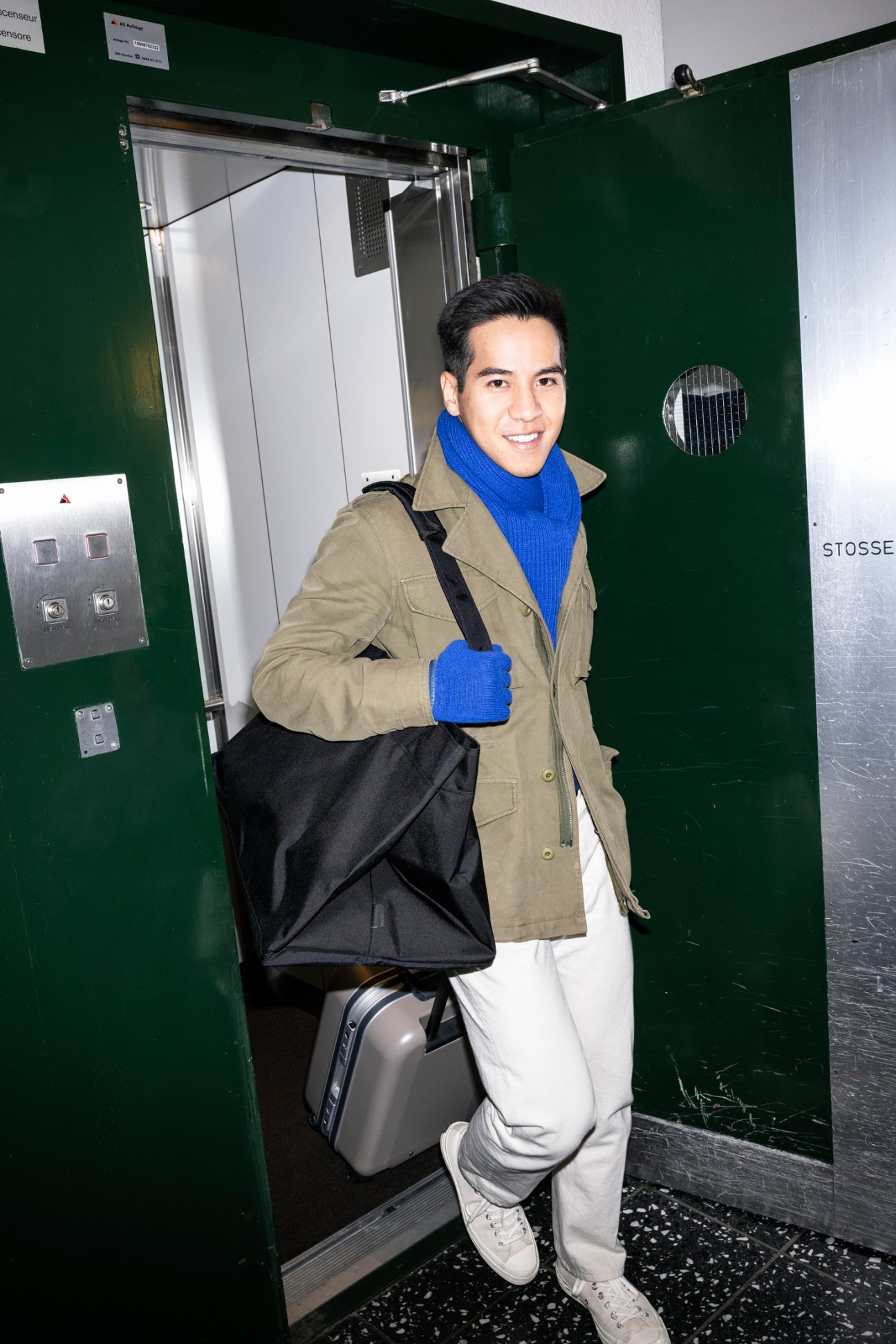 Chutipon Patumanont carrying black A Kind of Guise x Monocle Ekia bag