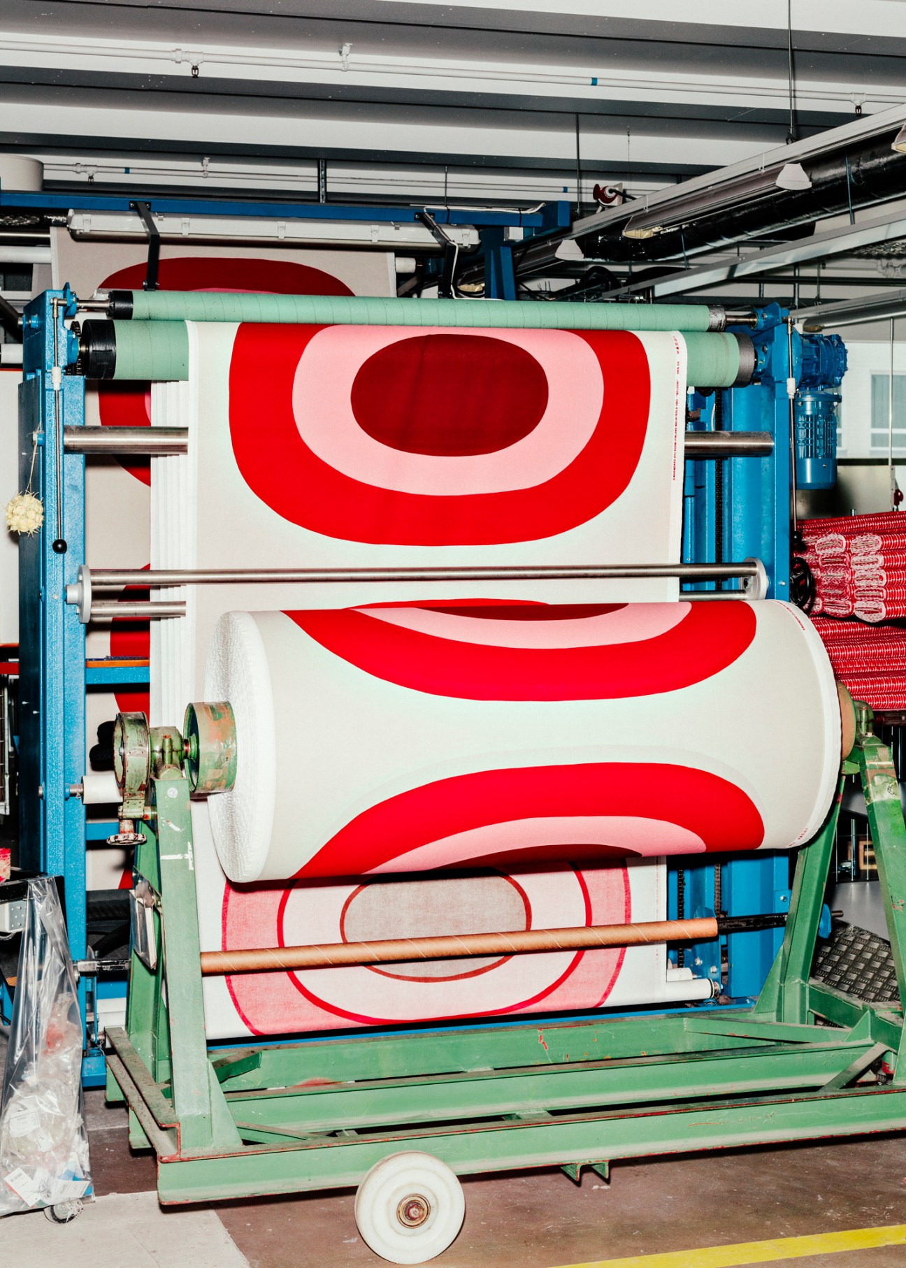A fabric press prints one of the brand's distinctive designs