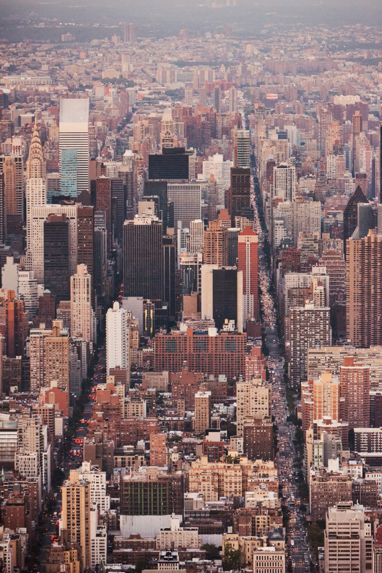Aerial view of densely packed Manhattan skyscrapers and buildings stretching to the horizon.