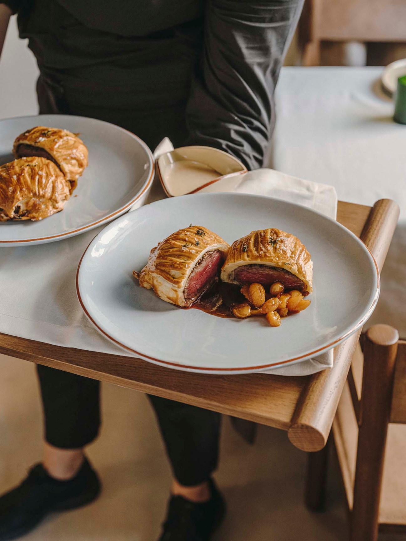 Sliced beef wellington dish served at Normal restaurant showing the refined yet approachable cuisine