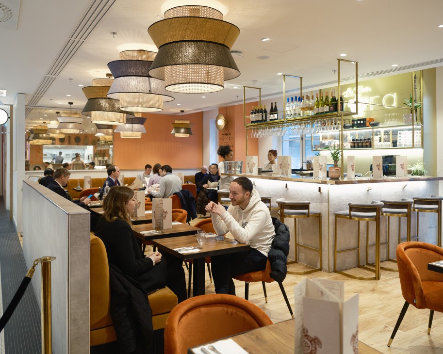 Busy lunch crowd dining in the restaurant floor during peak hours