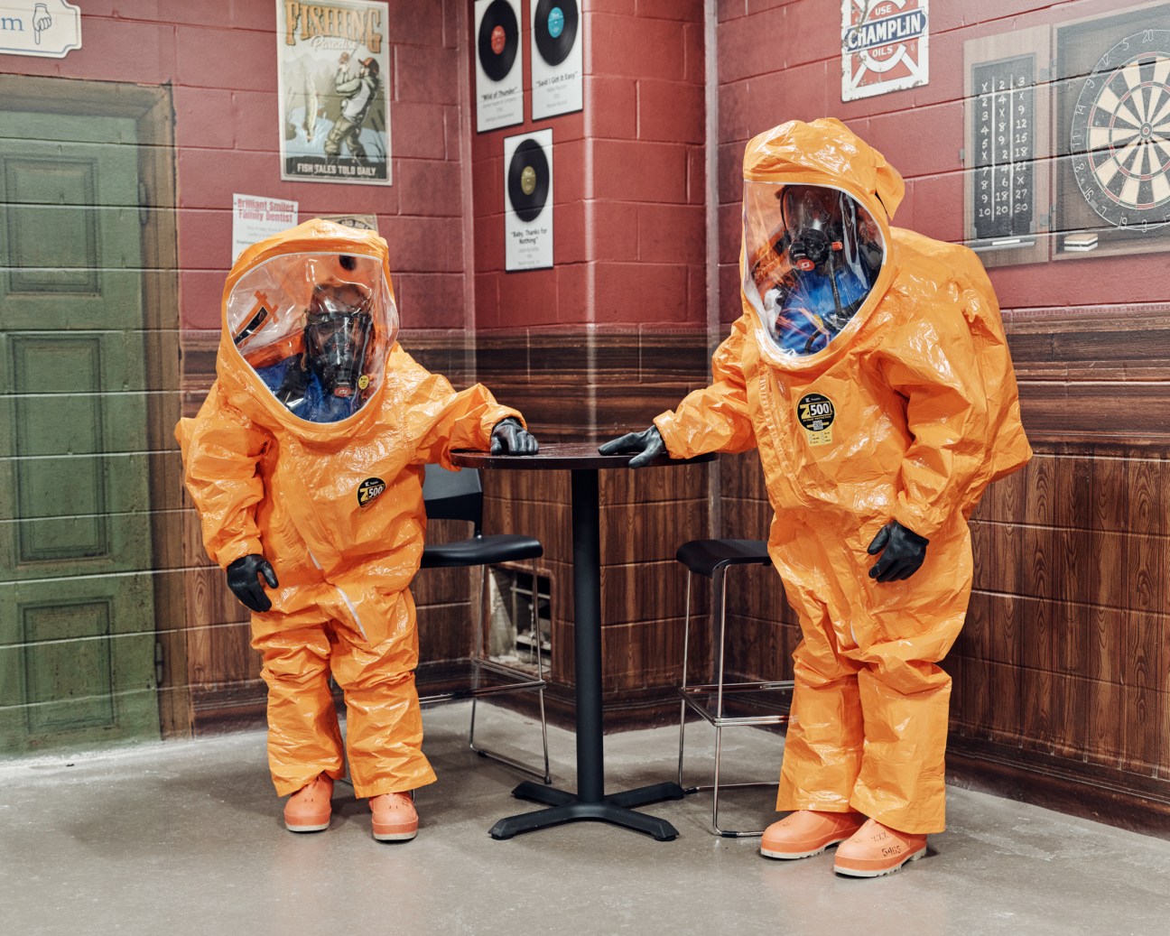 Emergency responders checking for harmful substances in the simulated bar area
