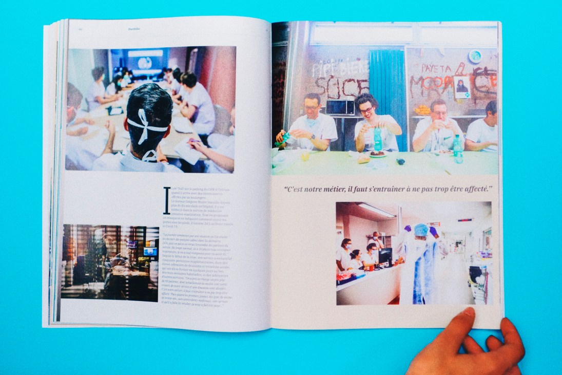 Open magazine spread showing colorful article layouts with photos and text