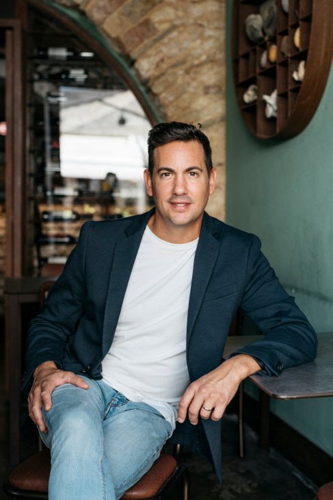 Miguel Gião, co-founder of Lodo restaurant, sitting at his establishment in Faro.