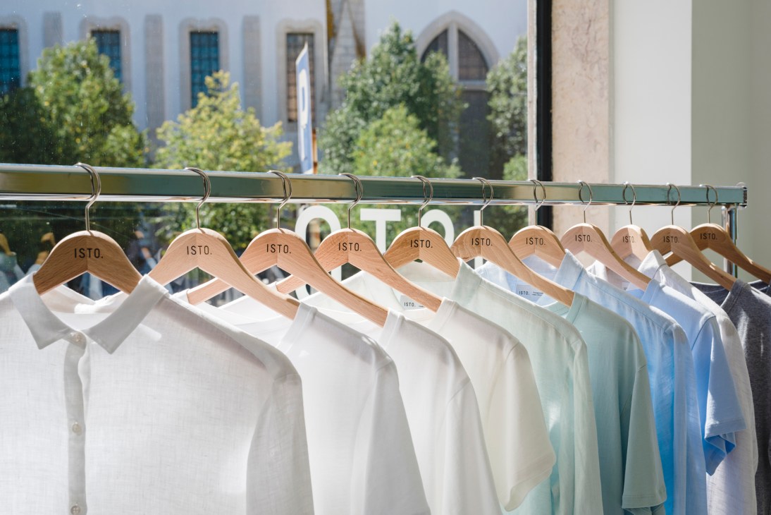 Portrait of man in sustainable fashion boutique setting