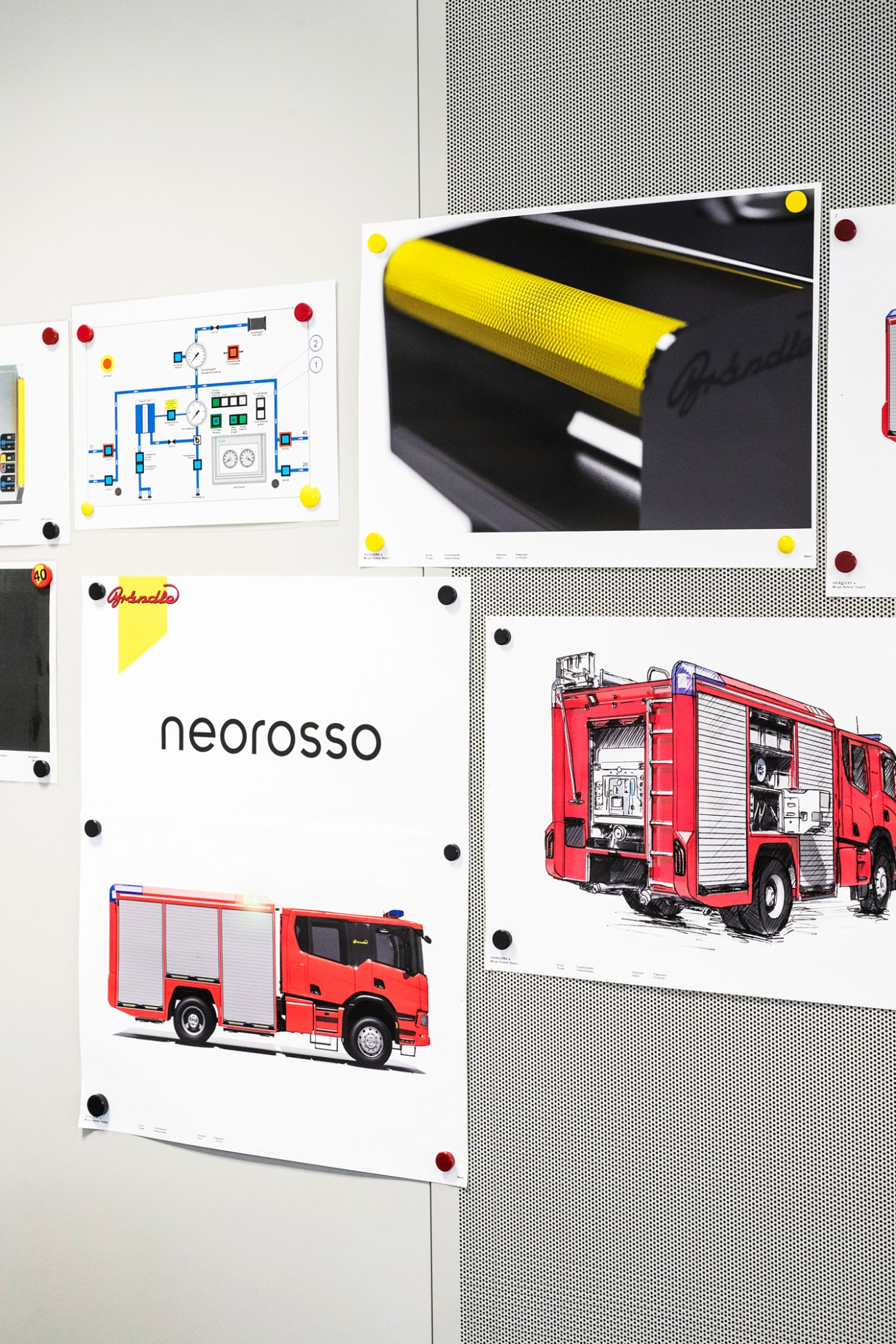 Design sketches and technical drawings showing the development process of the Neorosso fire engine on white paper