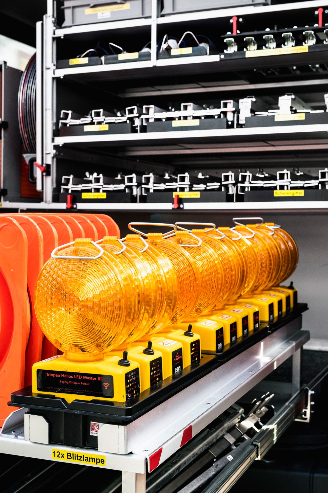 Neat and organized Swiss fire station with helmets and equipment properly arranged