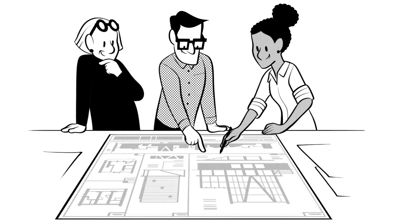 Three people collaborating around a table studying architectural blueprints and urban planning documents