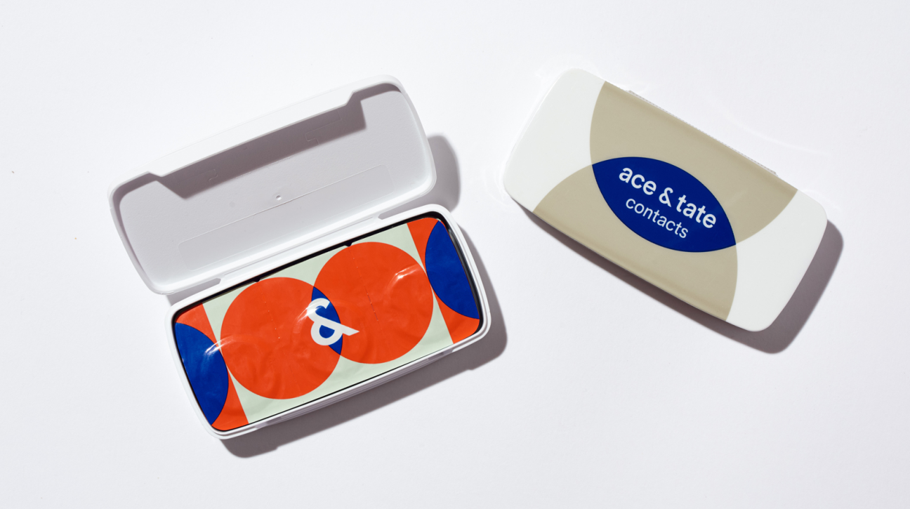 Ace & Tate contact lens packaging featuring colorful geometric design in open white case