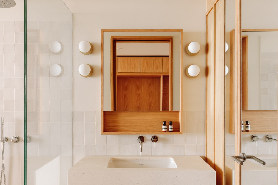 Modern bathroom at Aethos Ericeira with minimalist design featuring natural materials and clean lines