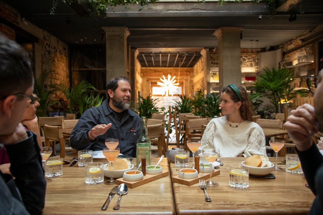 Mexico City chefs gathered around a dining table at Caracol de Mar restaurant during a roundtable discussion.