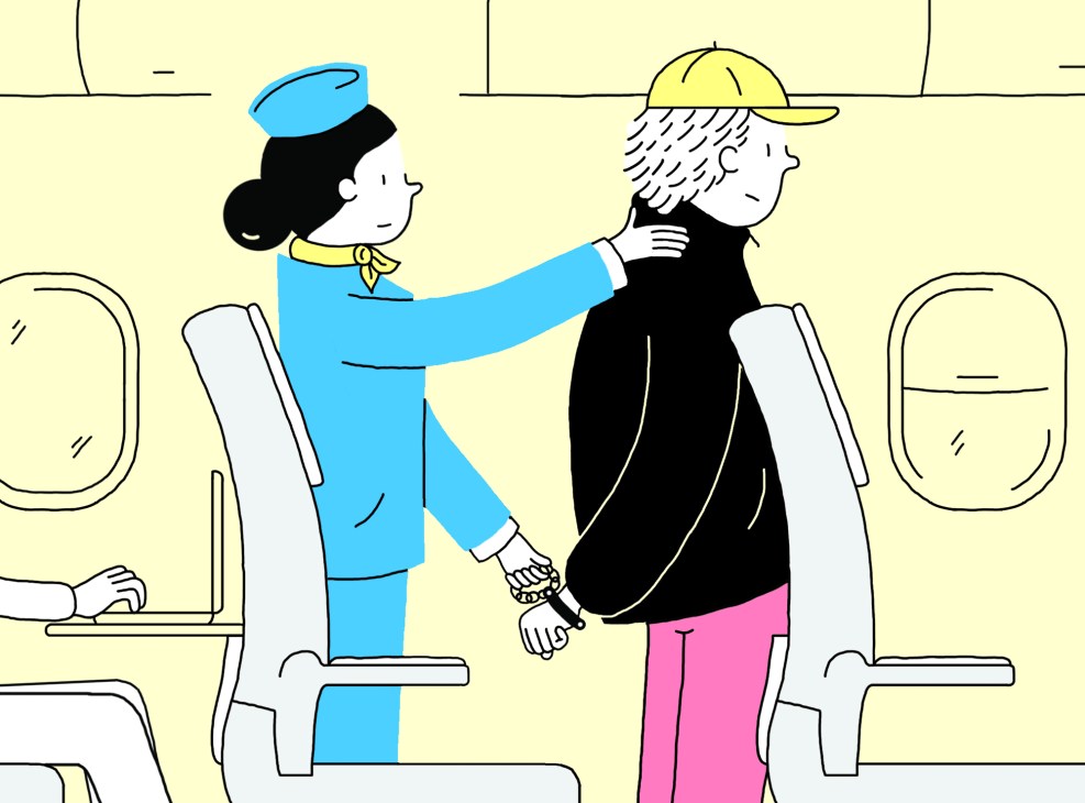 Flight attendant restraining disruptive passenger on airplane
