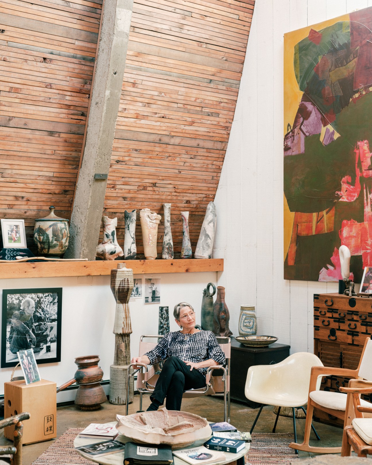 woman sitting on a gallery bench