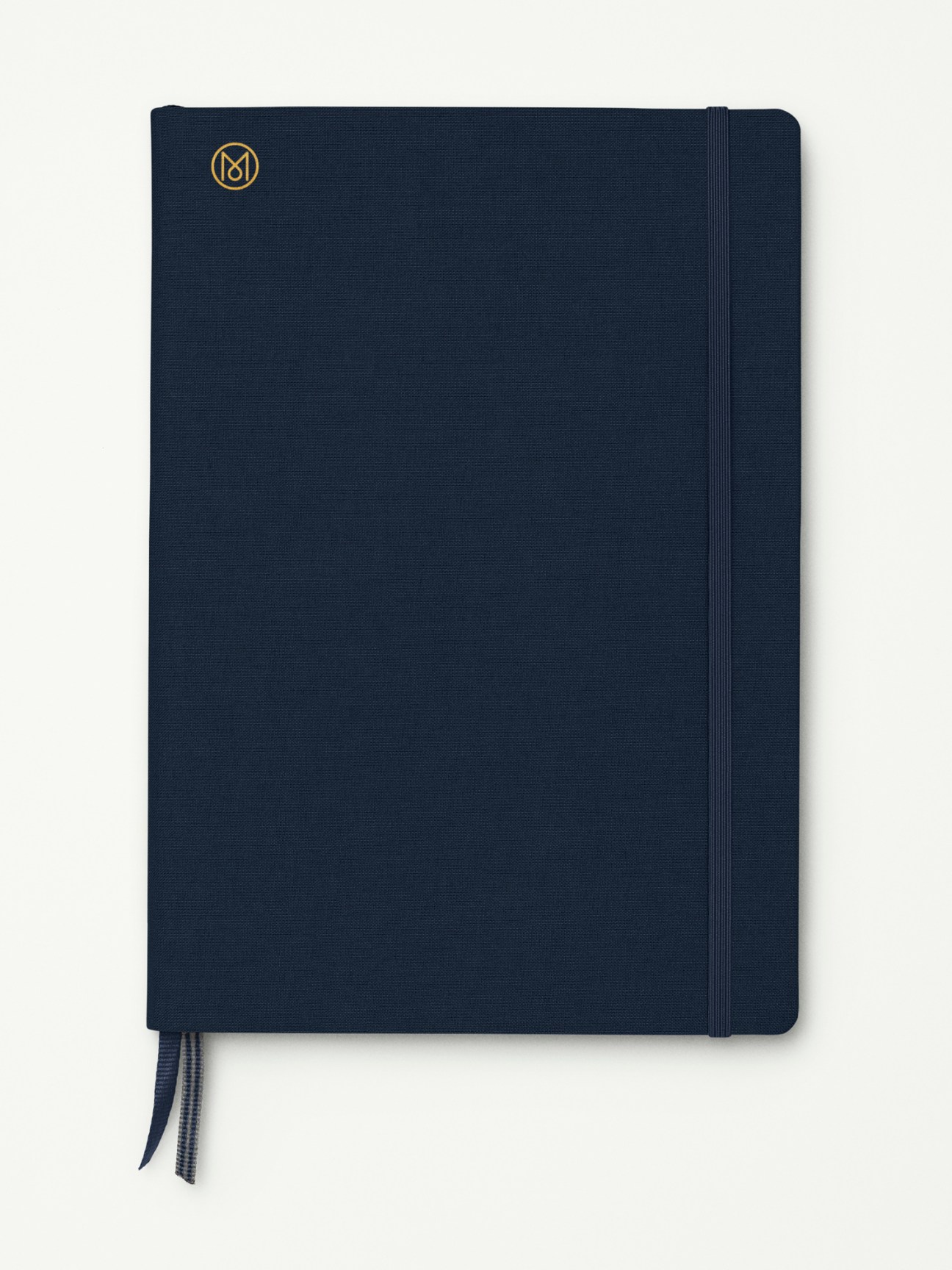 Leuchtturm1917 x Monocle large B5 softcover linen notebook in navy with elastic band and ribbon bookmark.