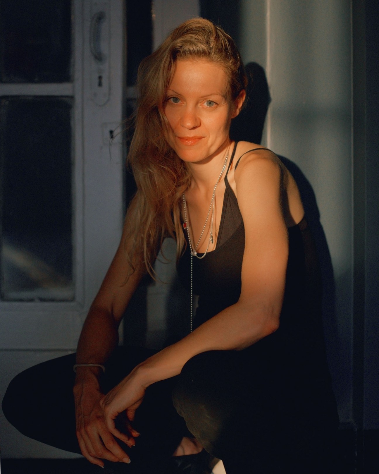 Dutch choreographer Nanine Linning seated in black clothing at Dom Radio