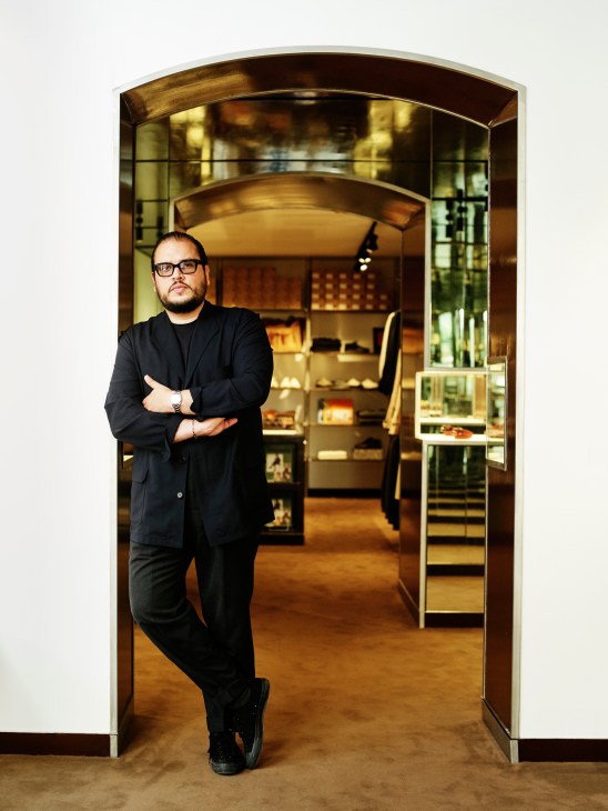 Portrait of Basile Khadiry co-founder of Beige Habilleur standing in the Paris store