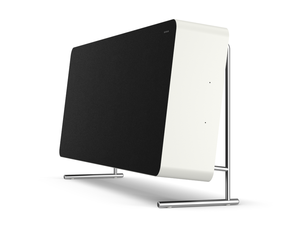 White cylindrical Braun LE01 smart speaker with black display panel on metal stand