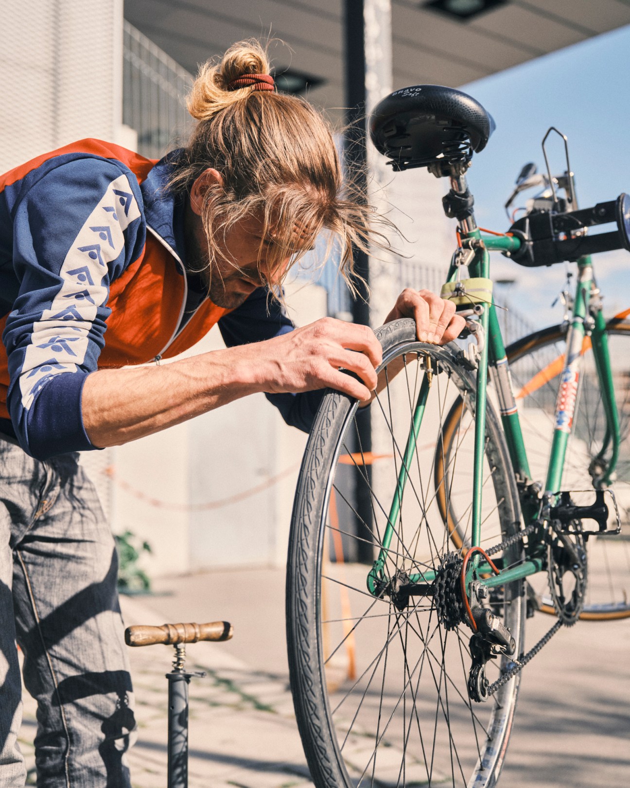 Person working on bicycle wheels and maintenance at the workshop repair station