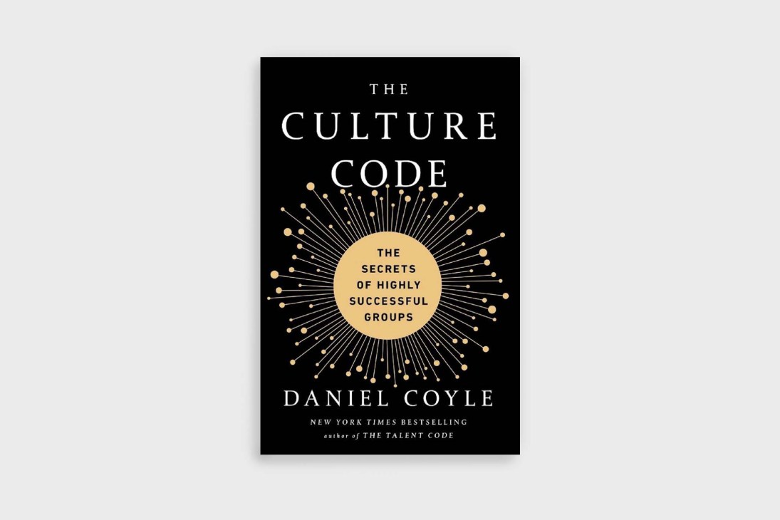 Book cover of 'The Culture Code' by Daniel Coyle featuring gold sunburst design on black background.
