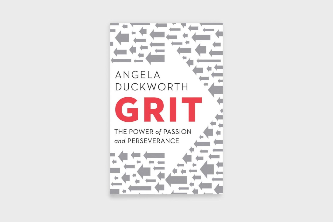 Cover of 'Grit: The Power of Passion and Perseverance' by Angela Duckworth featuring gray arrows pattern design.