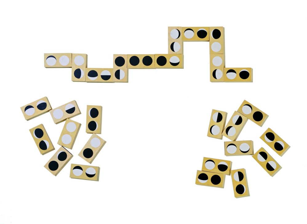 Wooden domino set featuring phases of the moon by Fredericks and Mae