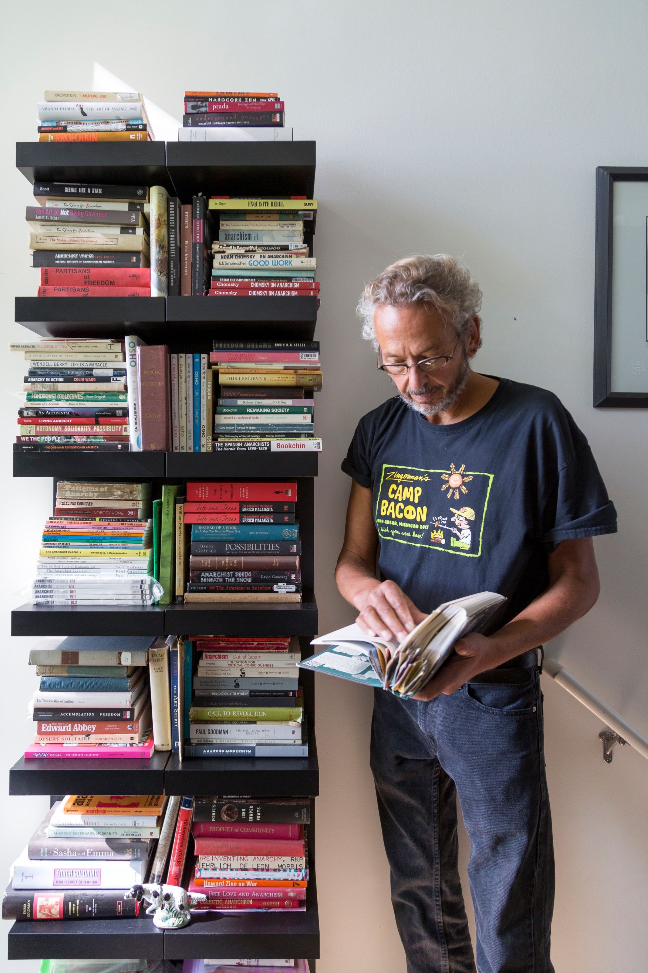 Ari Weinzweig sitting among books in his office