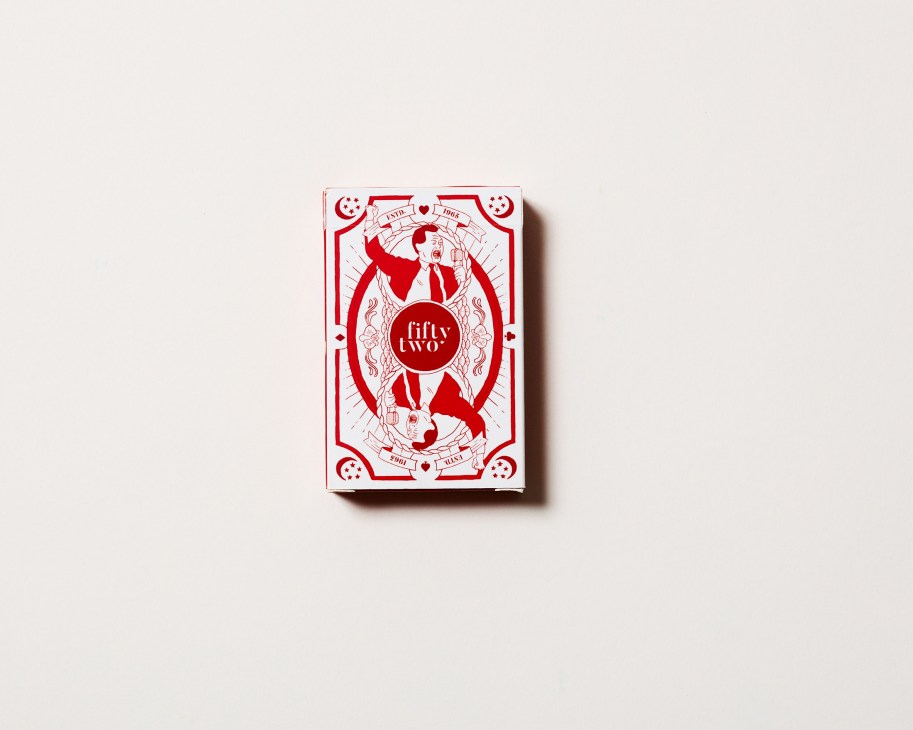 Protocol playing cards celebrating Singapore's 52nd independence anniversary with red and white design.