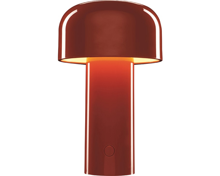 Flos portable rechargeable lamp with red cylindrical base and domed shade.