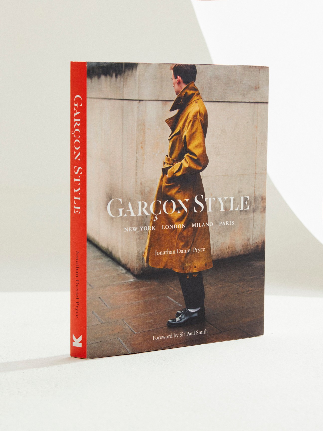 Cover of Garçon Style book by Jonathan Daniel Pryce featuring man in gold coat against concrete wall.