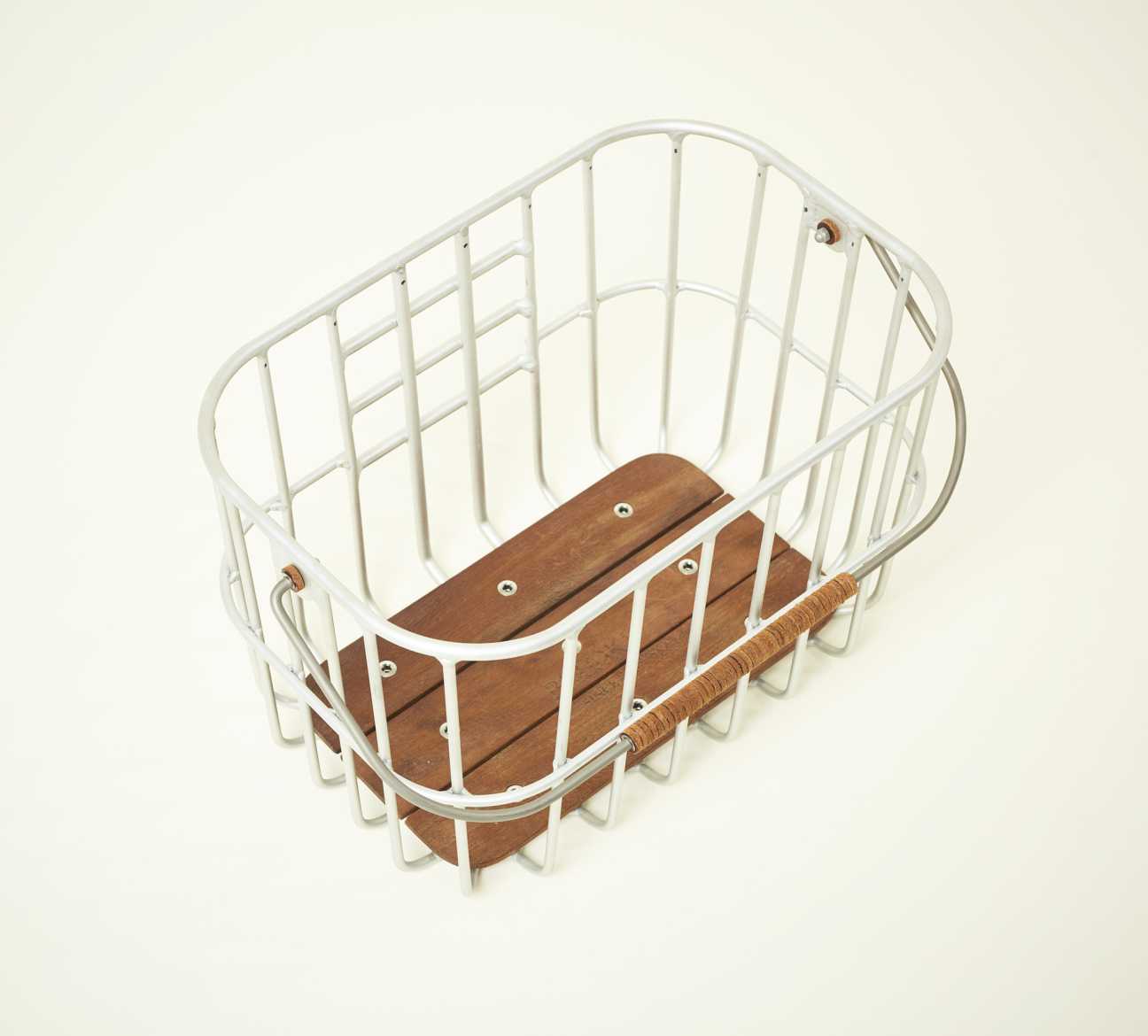 Brooks England aluminium bike basket with white frame and brown wooden slats with woven leather grip handle.