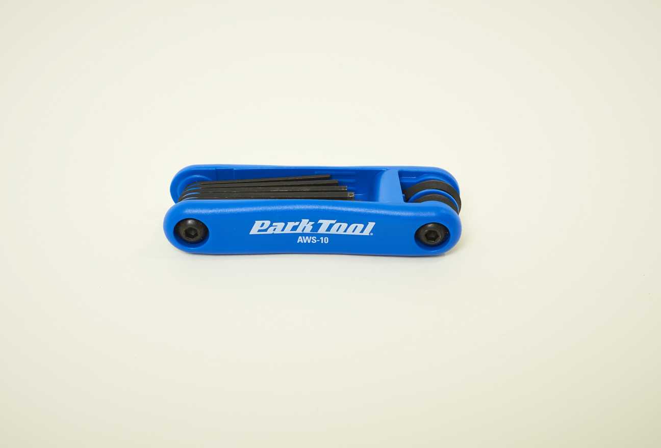 Park Tool AWS-10 blue folding hex wrench set with multiple Allen keys stored inside.