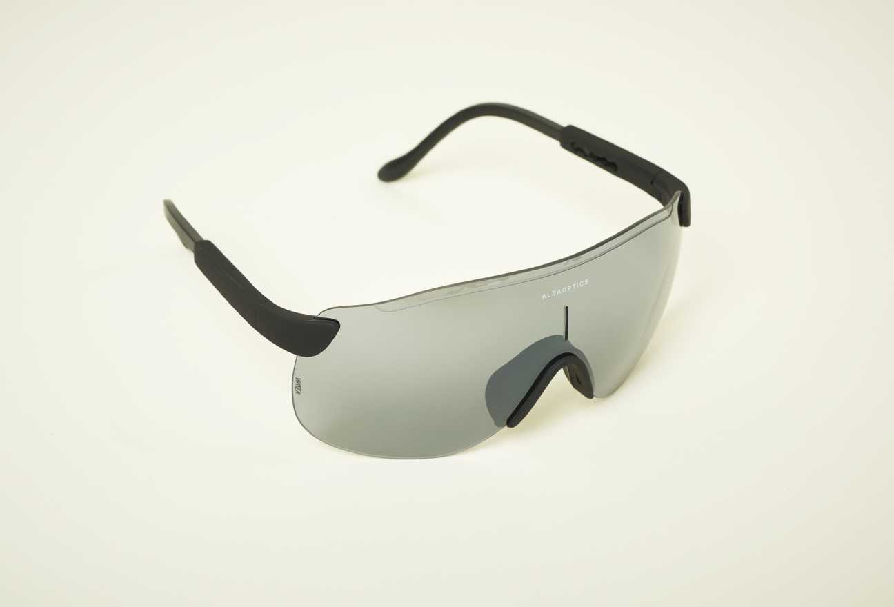 Alba Optics cycling glasses with white frame, black temples and interchangeable lens.