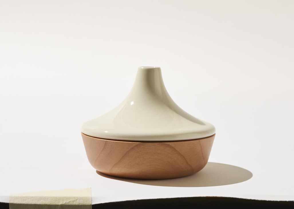Handmade porcelain vase with cream-colored conical top and wide cherry-wood base by Native & Co.