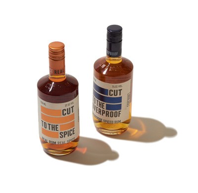 Two bottles of Cut Rum with orange and blue labels on white background.