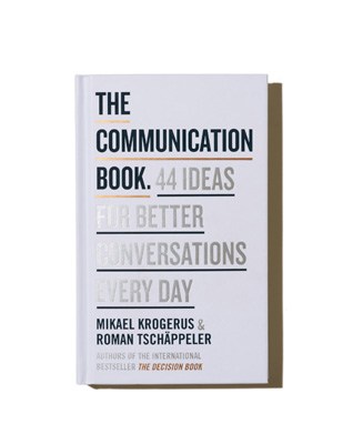 The Communication Book by Mikael Krogerus and Roman Tschäppeler with brown bookmark.