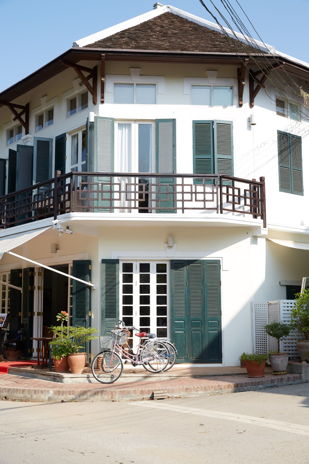 Belle Rive Boutique Hotel with French shutters overlooking the Mekong River in Luang Prabang.