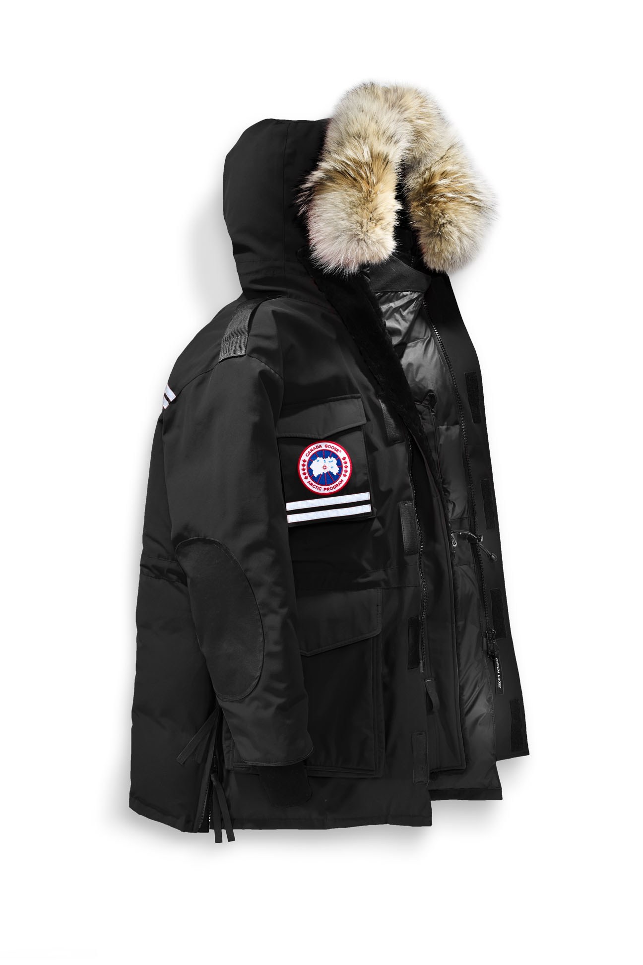Black Canada Goose Snow Mantra parka with coyote-fur hood and Arctic logo displayed on white background