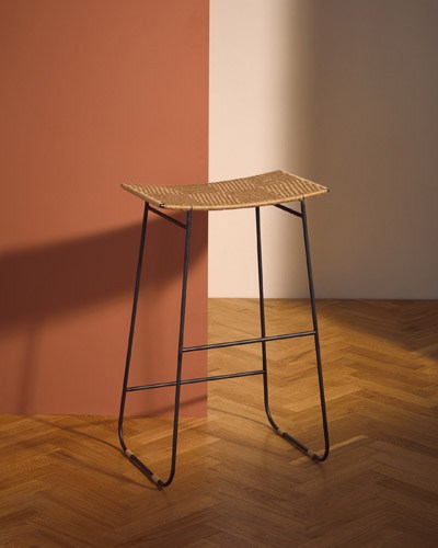 Shibui stool by 2Monos with woven jute seat and black metal legs on wooden floor.