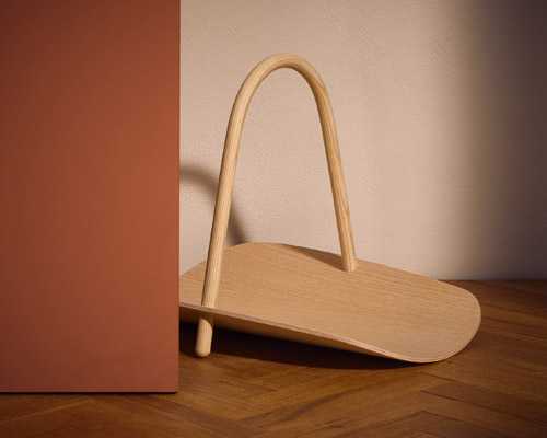 Fritz Hansen wooden basket with steam-bent handle and pressed laminated wood construction.