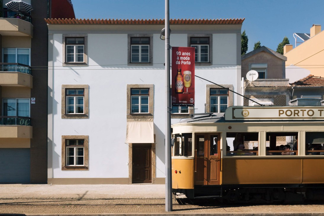 Exterior view of Duas Portas hotel showing converted 19th-century home overlooking the Atlantic Ocean