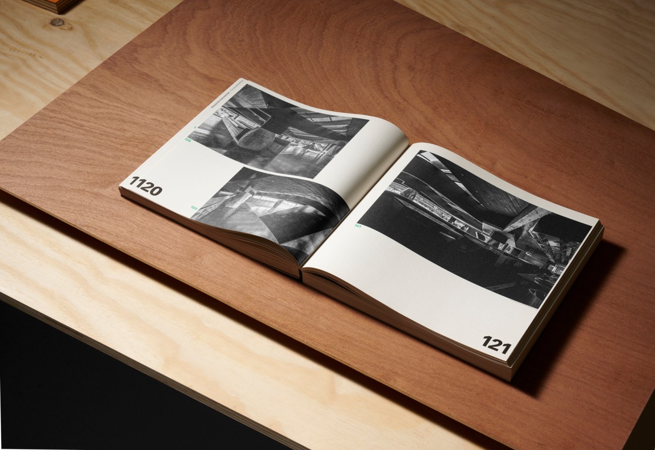 black and white catalogue pages on a desk