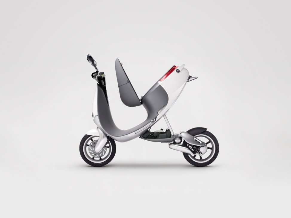 White and grey Gogoro Smartscooter electric scooter with red accent stripe shown in profile against neutral background.