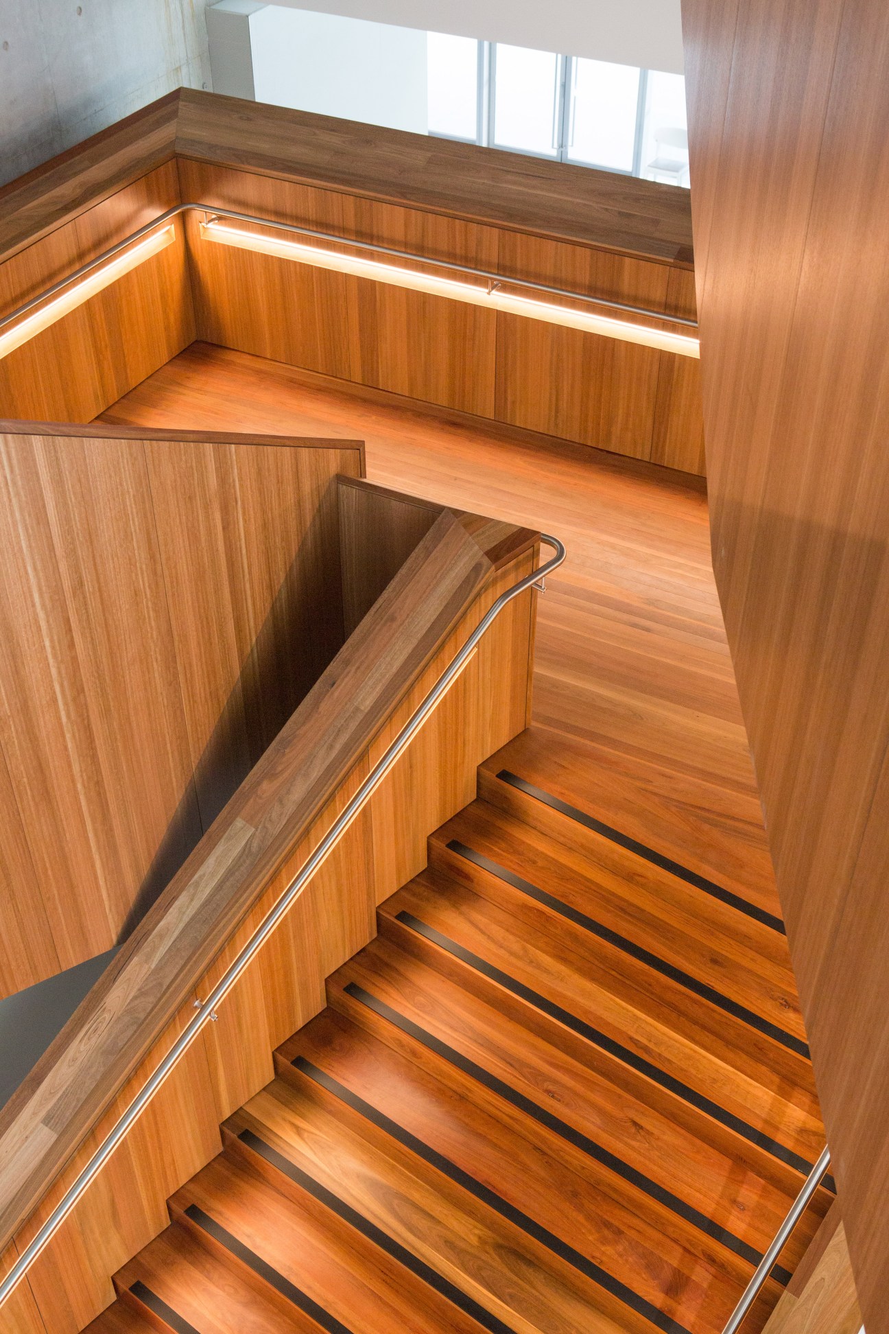 Wooden staircase with spotted-gum balustrades and ironbark treads at the International Convention Centre in Sydney.