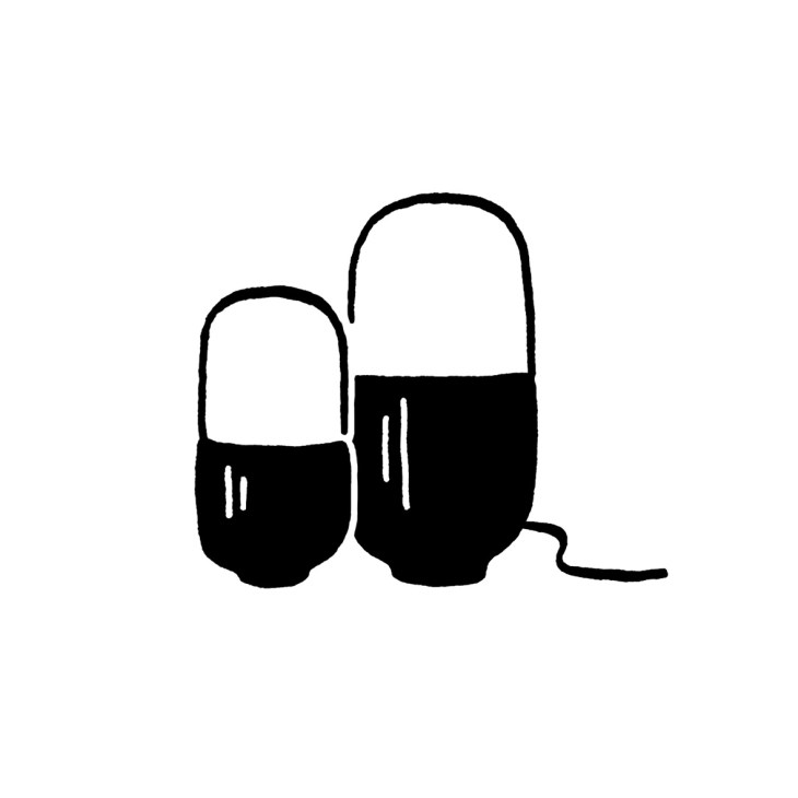 Simple line drawing of two rounded capsule-shaped candleholders with black bases and white tops.