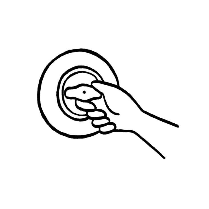 Line drawing of a hand turning a rotary light switch.