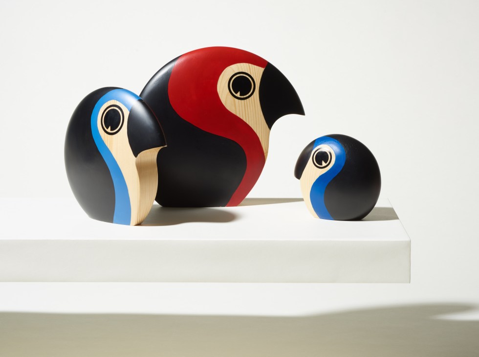 Three hand-painted wooden bird figurines in black, red, and blue by Architectmade.