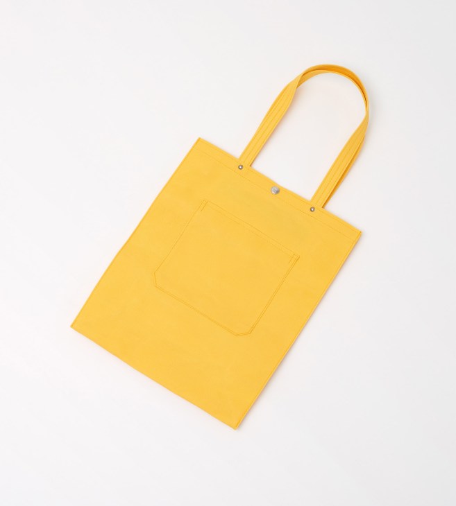 Bright yellow cotton-canvas tote bag with long handles and deep pocket from Ichizawa Hanpu x Trunk Clothiers collaboration.