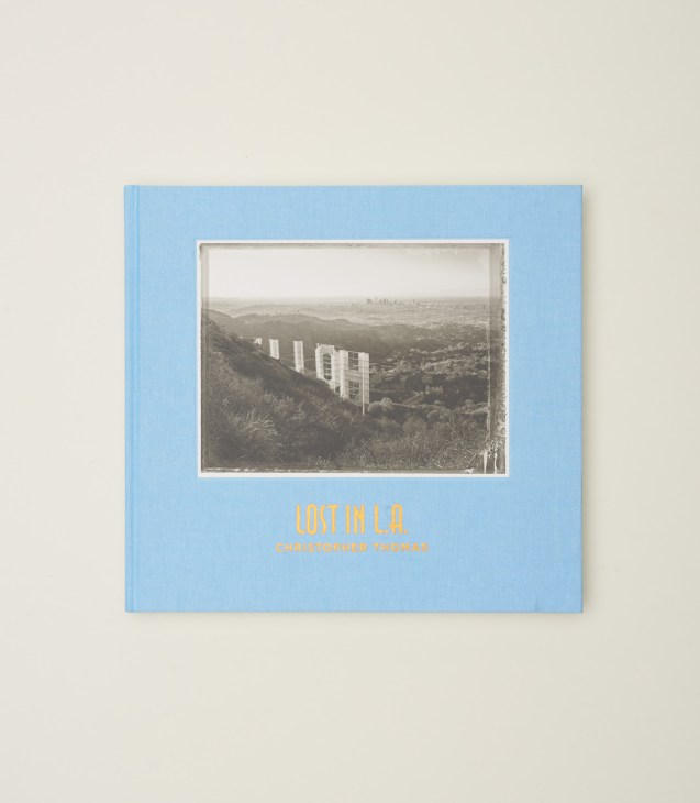 Cover of Lost in LA photography book by Christopher Thomas featuring black and white Polaroid-style Los Angeles imagery